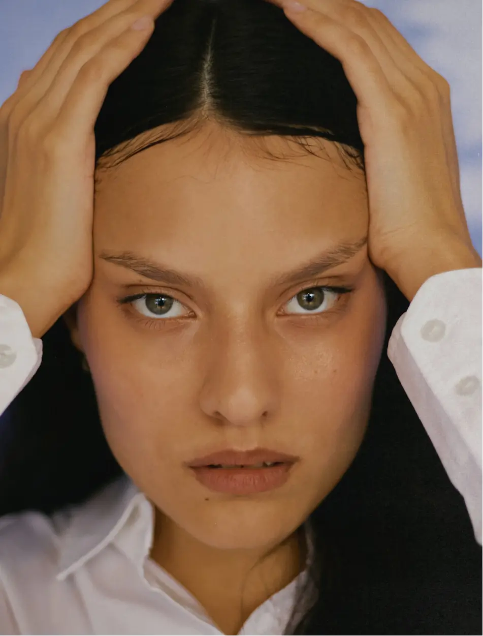 Supermodel like portrait of a woman staring at the camera, super retro vibes
